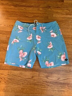 Rip Curl Teal Swim Board Shorts with Pink Floral Print